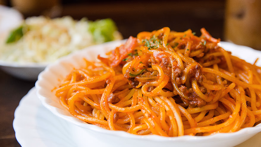 Neapolitan spaghetti with grated cheese and Tabasco. Sometimes iced coffee.