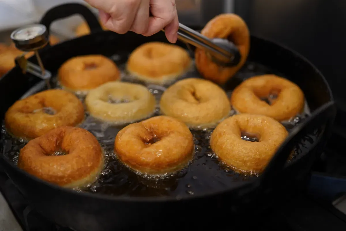 The action camera is attached to the chest using a chest mount.