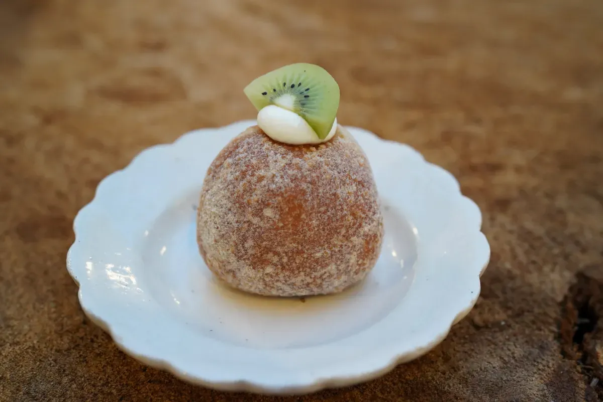 The action camera is attached to the chest using a chest mount.