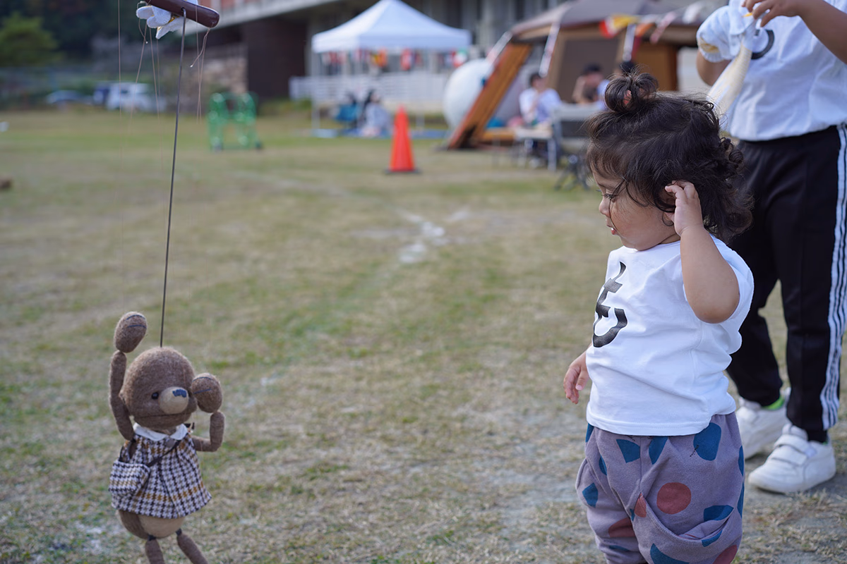 The second son of the Katori family and his marionette, Porta