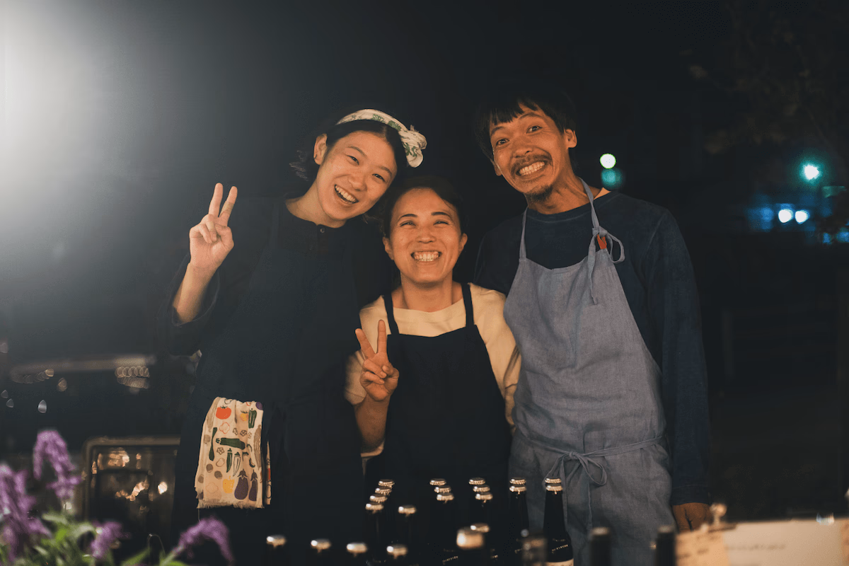 Commemorative photo of three people