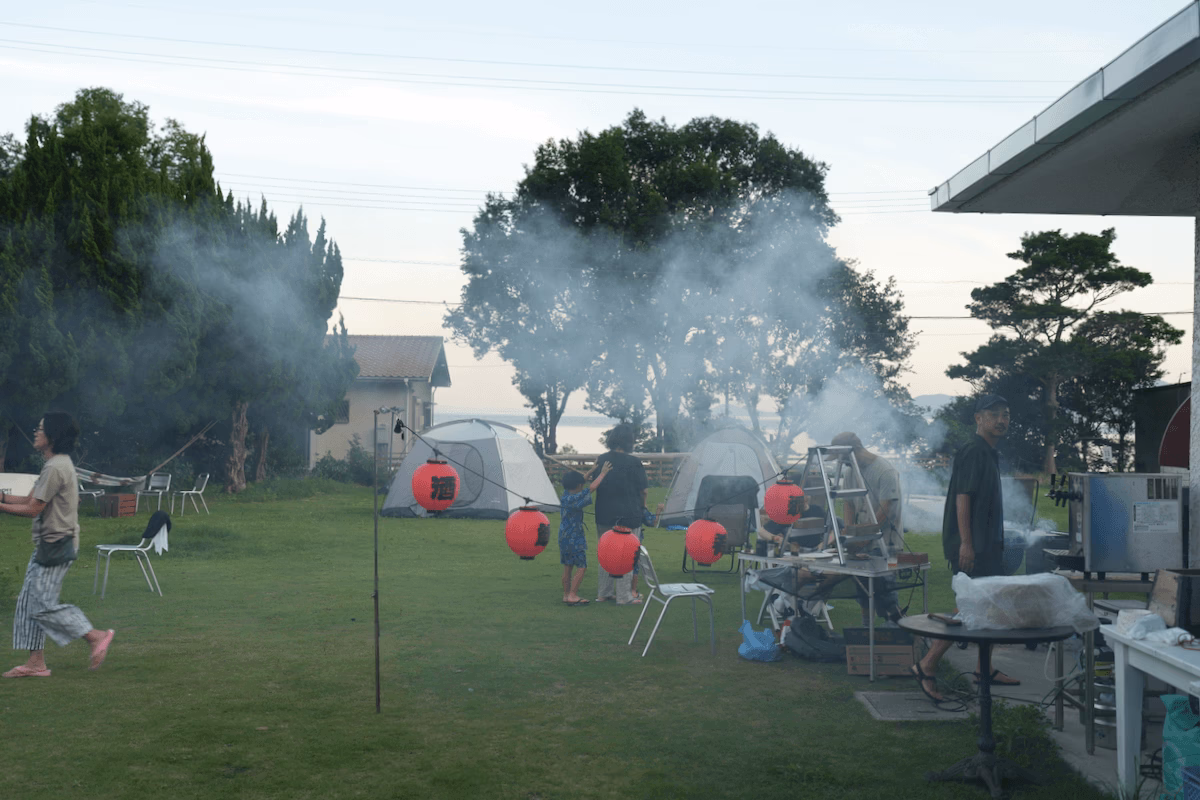 Members preparing for a barbecue in the garden
