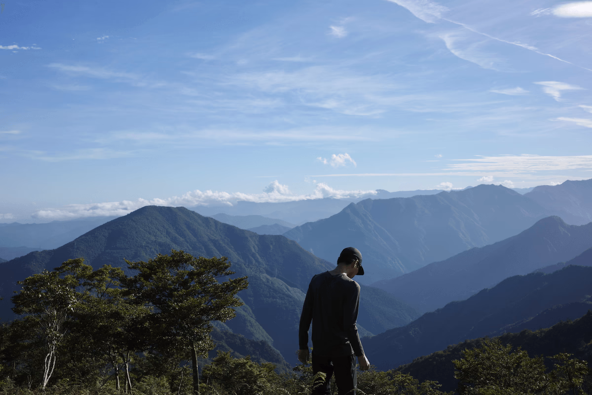 The mountain ridges below