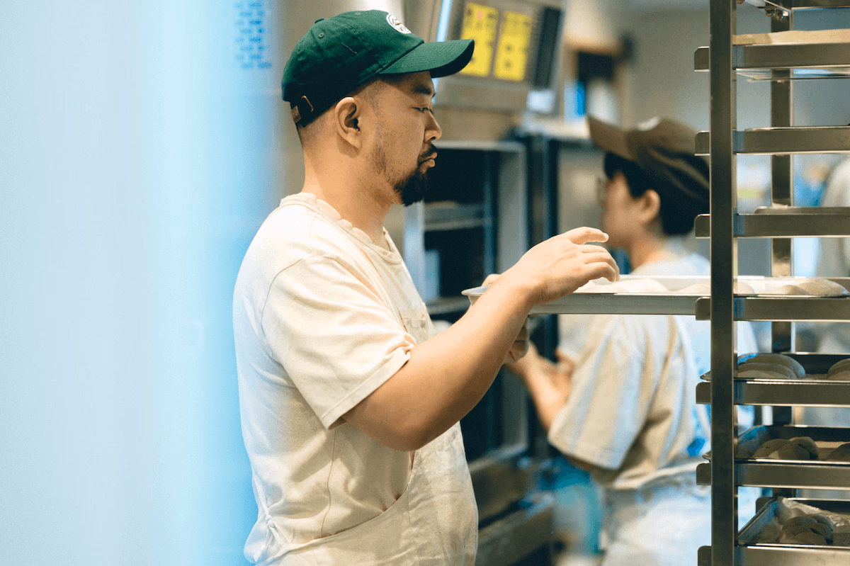 Mr. Sasagawa checking the baked bread