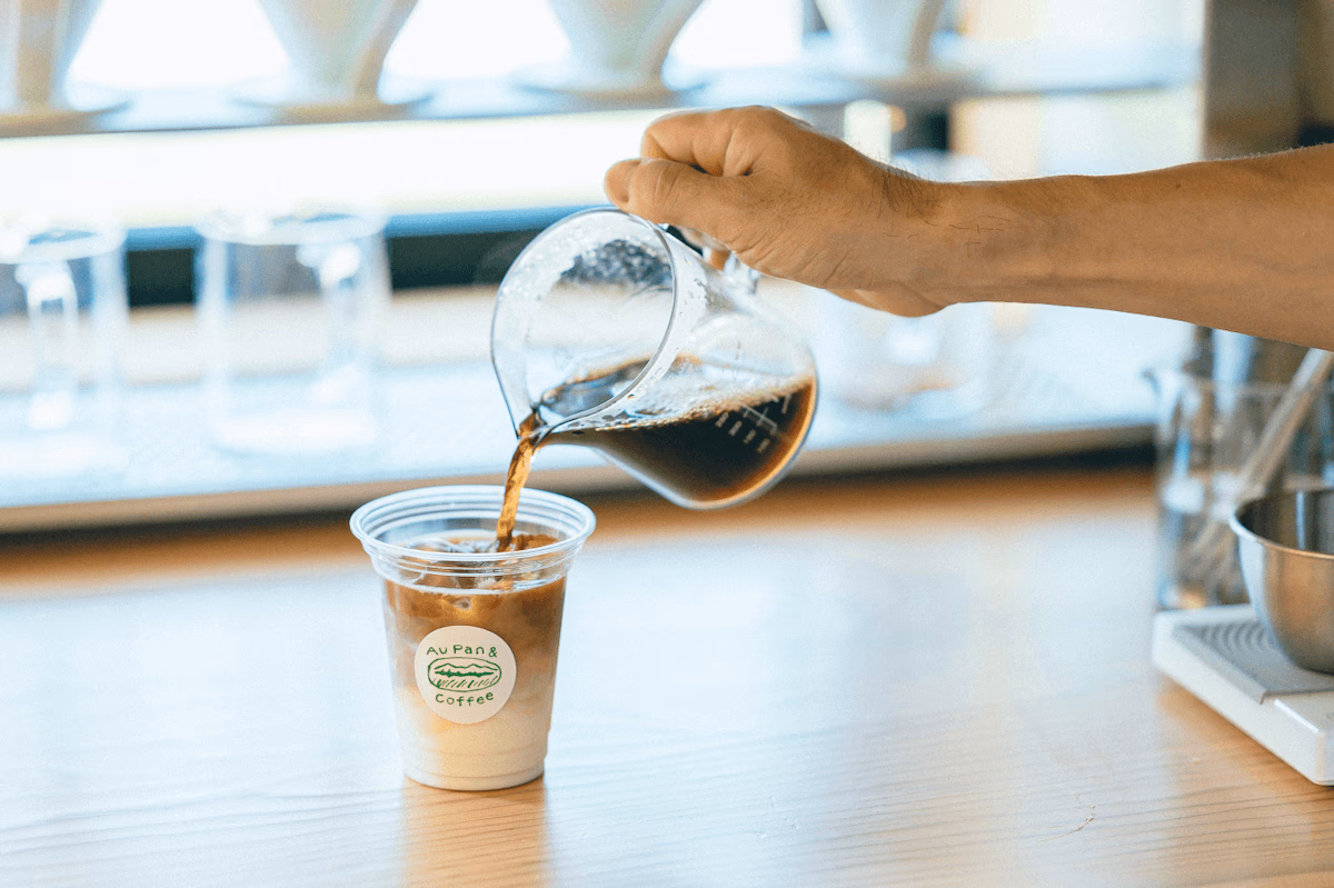 Pour in the coffee to make cafe au lait