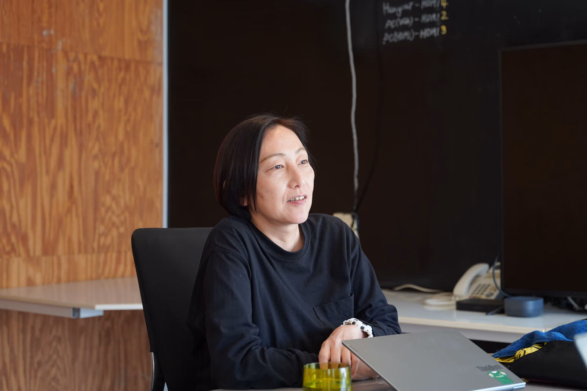 A woman talking cheerfully